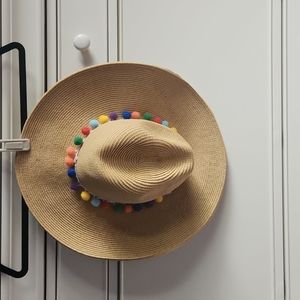 NWOT Straw beach hat with multi color pom.poms